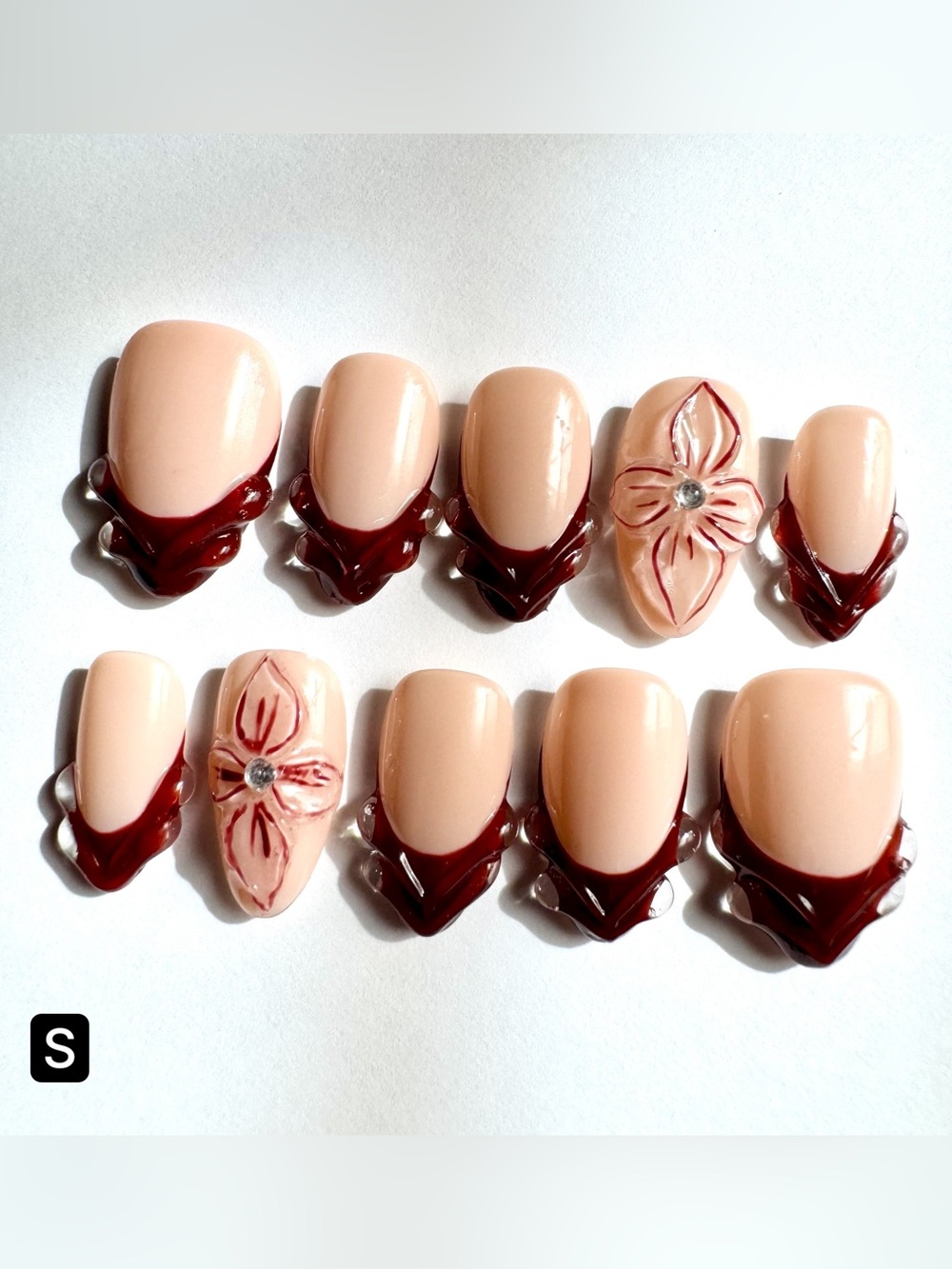 Peach Nude Press-On Nails with Dark Burgundy Tips & 3D Flower Accent
